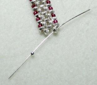 Continue to bead one size 11 seed bead in between each spacer bead, down the side all the way to the other end.