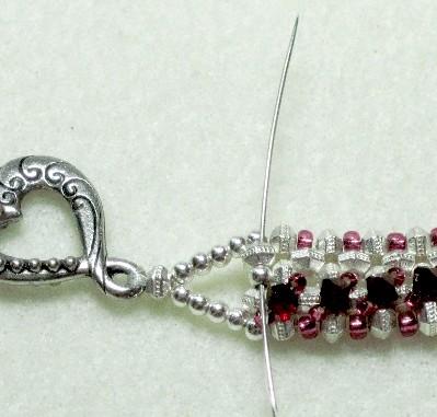 Put one size 15 seed bead, one 3mm crystal and one size 15 seed bead on your needle.
