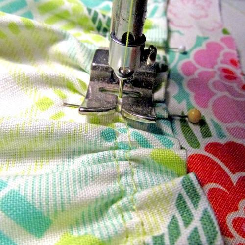 Stitch the flounce in place, running the seam in between the two lines of gathering stitches. 9. Remove the gathering stitches. 10.