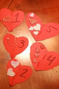 Heartbreaker Game Red and pink construction paper Marker Scissors 1. Make five hearts and cut them in half. (They don t have to be the same size or cut down the middle the same way). 2.