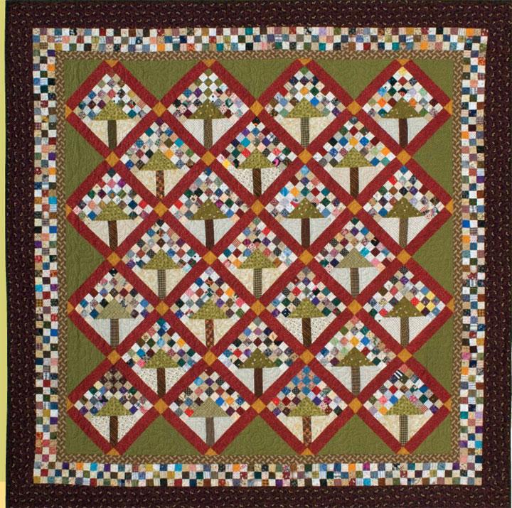 #304 CRAB APPLE Friday, March 29, 2019 All Levels Block Size: 8" Finished Quilt Size: 70" X 70" Make your own grove of crabapple trees from 1.5" scraps!