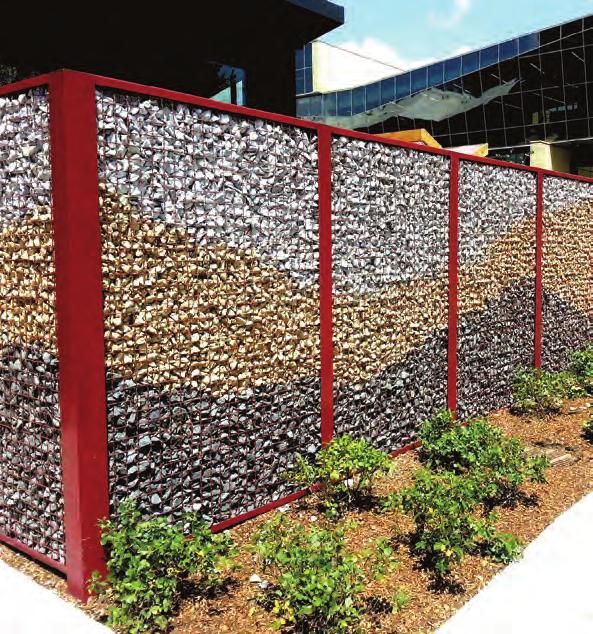 McNICHOLS McNICHOLS ECO-ROCK was fabricated into a fence and filled with rocks of various colors. ECO-ROCK walls and boxes are decorative gabion-style wire work containers.