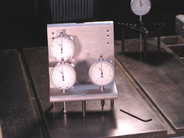 Picture 6 shows the Dial indictor with the Black Knurled Pointed Anvil moved to position 4 on the SQ2 and preset to.100.