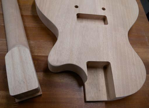 Set the neck This is a set-neck kit with a mortise and tenon joint, meaning the heel of the neck (the tenon) is glued securely into the neck cavity (the
