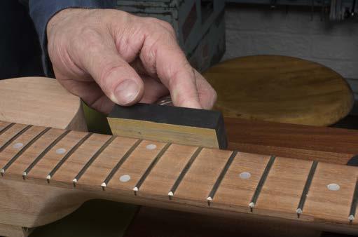 Fretwork Seat the frets The frets come installed, but they need a little work to achieve the best playability. Use a fretting hammer to make sure the frets are all seated properly.