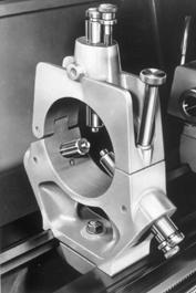 16 Lesson One Fig. 1-17. The steady rest and its function Chuck Facing tool or other cutter applied here. Headstock Steady rest Workpiece Lathe bed 1.