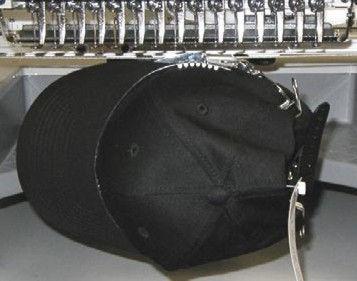 Take the blank cap that is attached to a cap frame located in your supply box and put it on the machine.