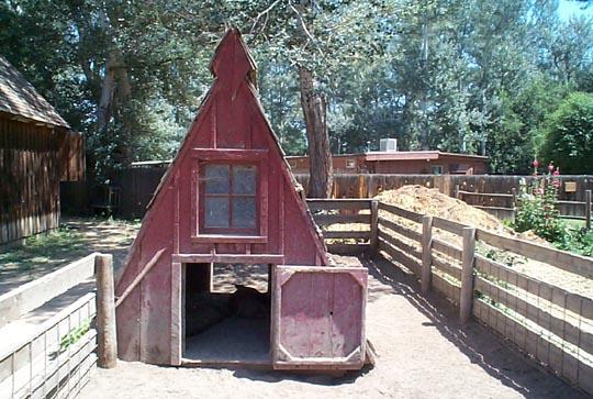 Hog house The triangle shape A frame has several virtues for housing hogs. One is that is allow the sow (mother pig), when she is having offspring, to lie down without rolling on her newborn piglets.