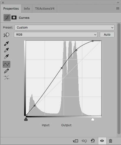 With a Curves adjustment, there is no slider corresponding to the mid-tone slider in Levels - instead we have something much more powerful.