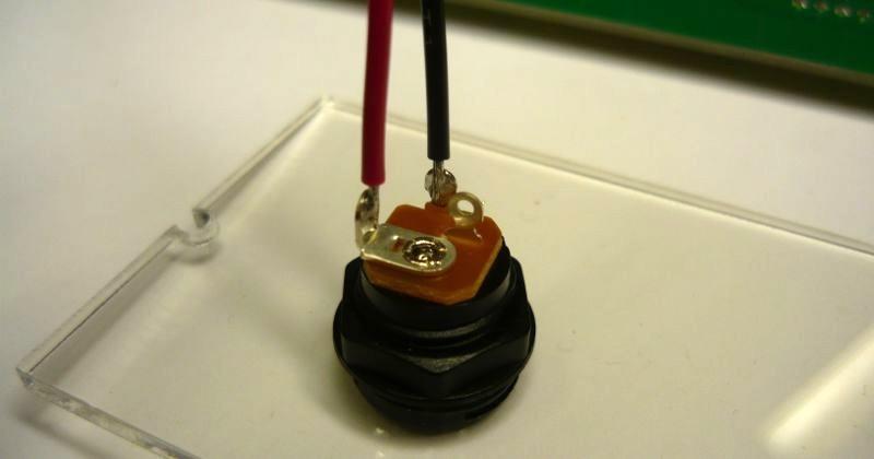 Finally, solder the wires to the connector. The red wire will be the center connection (the positive) and the black wire the outside connection (negative).
