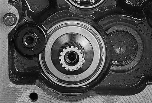 Figure 12. Cutterhead removal. 27. Visually inspect all bearing bores, both on the headstock and in the gearbox, and remove any burrs or rough spots that are present. Helical Gear Cap Screw Figure 10.