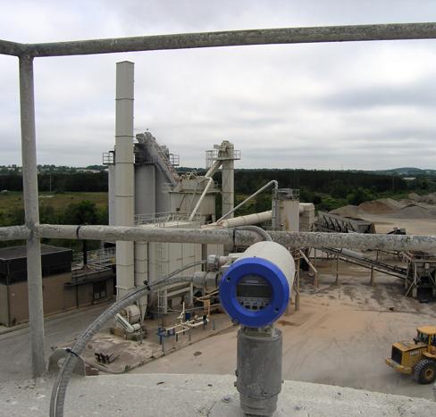 Many companies still just use a visual check or a point level sensor, like a rotary paddle bin indicator or an RF capacitance probe, to let them know when the material in the silo reaches or departs