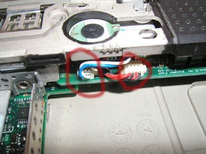Remove the two cables from the Sound AC board as shown. (Note these are harder to remove than previous cables.