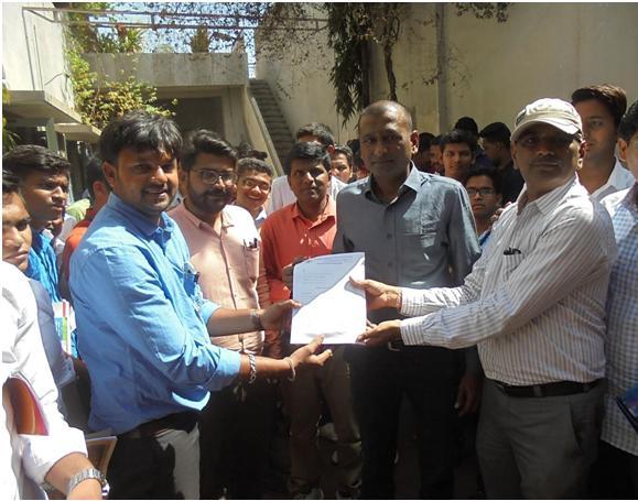 Giving thanking letter to Mr. Rajivbhai and Mr.
