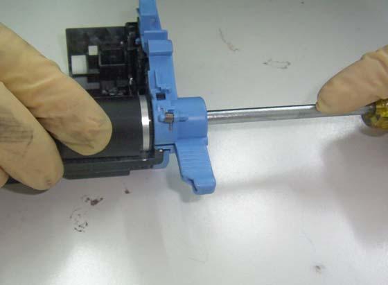 50. Rotate the spindle back and forth to align it with the