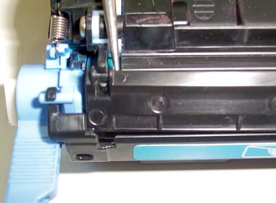 shutter toner hopper tab out from its housing on one side