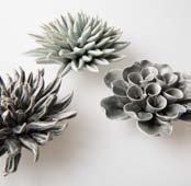 These stand-out ceramic flowers, perfect as a centerpiece or home decor, make a grand impression, like an ode to nature.