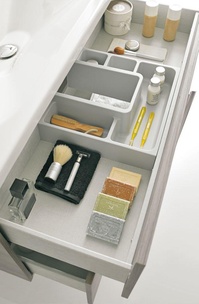 Drawers with textile effect and greater opening and depth.