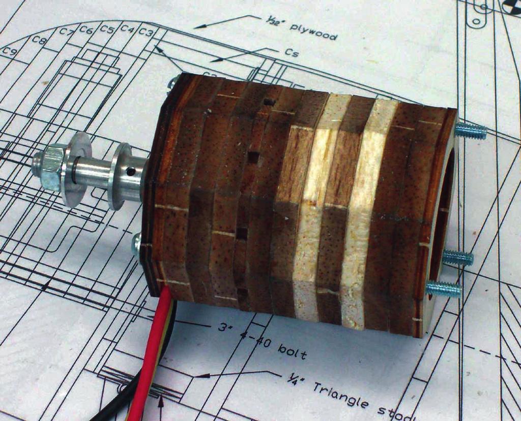 The two sections are joined together using a piece of laser cut 1/8 balsa as a separator. This 1/8 balsa piece has notches in it to serve as locator pins for the dummy cylinders.