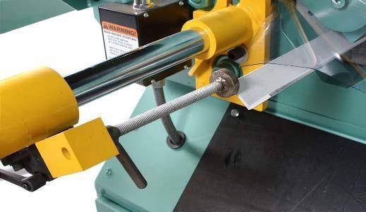 The backgauge mounts on the drop side of the machine and uses a compression sleeve for infinite, easy adjustment to gauge cut lengths in the angle, flat bar and round bar