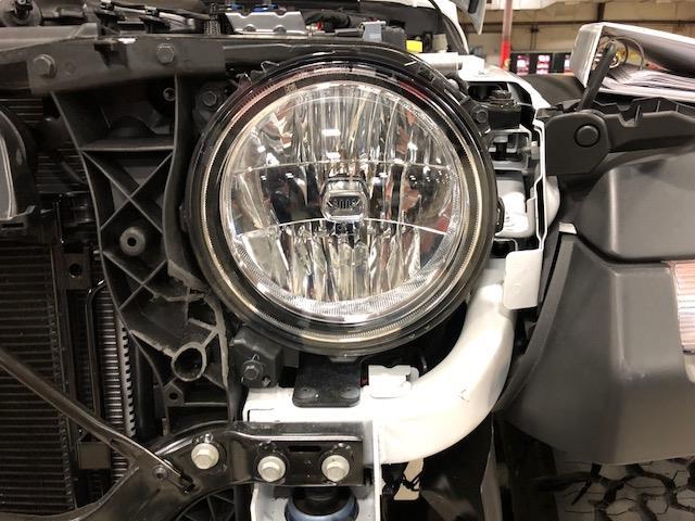 10. Remove headlights by removing 3 M6 bolts around the light and