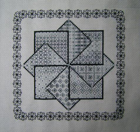 These are traditional colours for blackwork but adding specialist threads adds a distinctive quality to the embroidery.