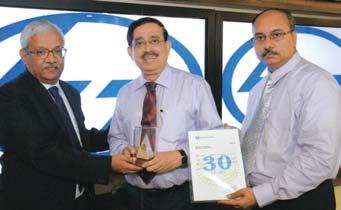 Irudaya Raj D, General Foreman (Elec), PT&D (Intl.)-UAE, receives his award from Mr. T.