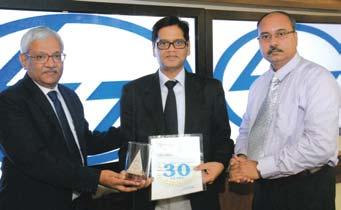 Venkatesan Iyengar, Manager (Administration), Sharjah Office, receives his award from Mr. J.S. Sudarsan, EVP & Head-PT&D IC Mr.