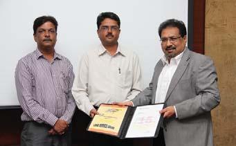 Manager (Civil) (B&F IC), receives his award from Mr. Niranjan Simha Mr.