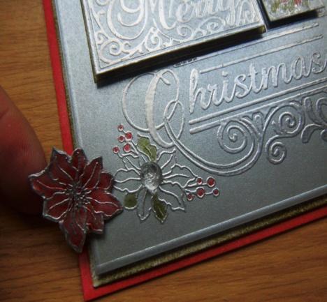 Cut the poinsettia flower out of the off cut that was embossed when making the decoupaged piece.