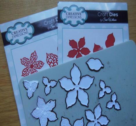 Cut & emboss using the classic poinsettia & the filigree poinsettia dies. Here the 240gsm foundations coconut card has been used.