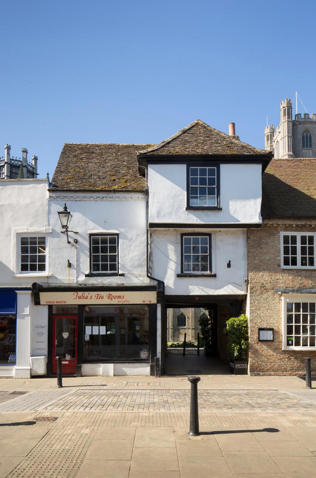 STEEPLEGATE, 16 AND 18 HIGH STREET, ELY As part of the Early Fabric in Historic Towns: Ely project the basement of 16 High Street, currently the premises of Julia s Tea Rooms, was visited and