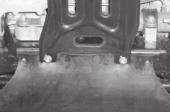 4. If the vehicle is equipped with a transaxle skid plate, remove the two front skid plate bolts.
