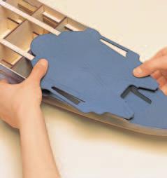 When the glue is dry, spray again with battleship grey paint, taking care to spray evenly and not to smear the