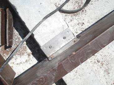 - Use perpendicular stainless pieces (or other materials) to set the square.