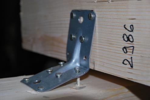 Figure 1. Spatial joint made by steel angle bracket after load-bearing test.