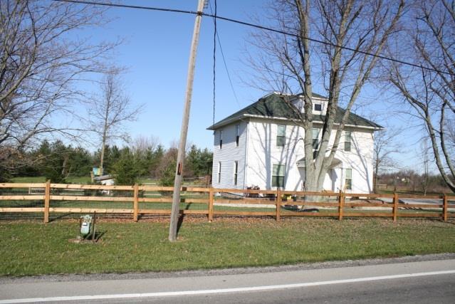 Photo 3: Remodeled farmhouse found at the extreme eastern