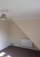 Including white tiling, with darker tiled skirting boards. In good condition. Tile grouting and sealants are in good and clean condition.