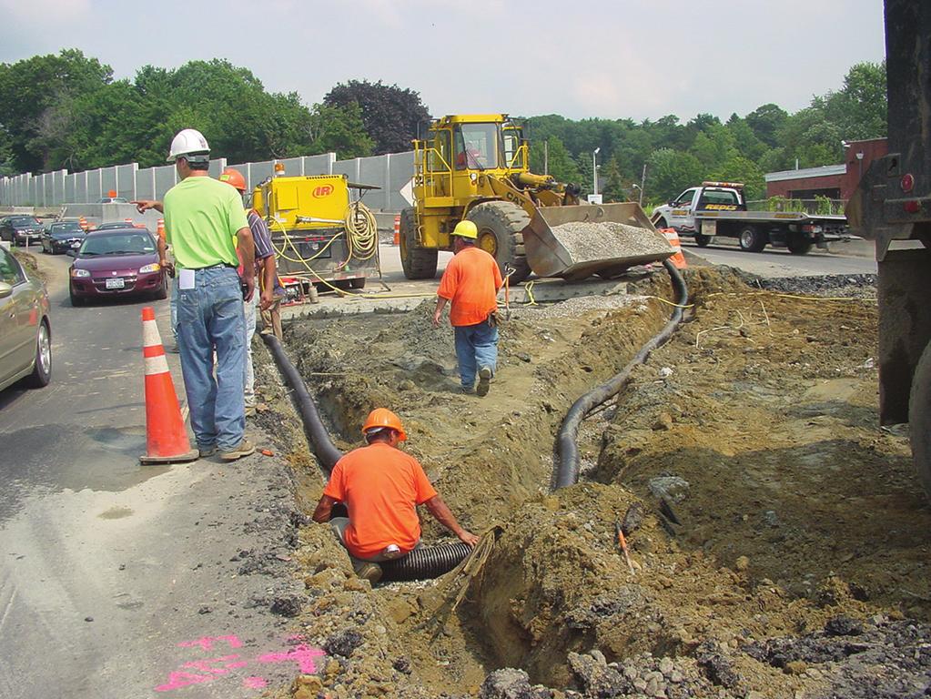 For example, the planned undercutting operation on the intersection project Figure 8.30. Extensive subbase repair prior to JPrCP installation (visible in the background). seen in Figure 8.