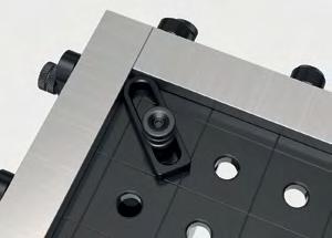Oblong slots provide adjustment while holes provide anchoring points for accessories such as clamps and