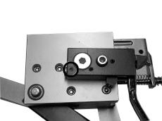 , using the supplied L- shaped hex wrench, turn the adjustment screw (C) located on the left side of the latch block counterclockwise to increase the engagement of the brake release latch with the