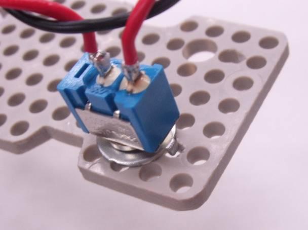 First, we will mount the MCU board power cable toggle switch.
