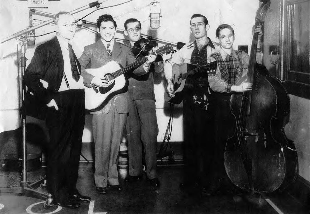 courtesy of Elaine Vaccaro l-r, Cas Walker, Danny Bailey, Willie G. Brewster, Ray Brewster, Junior Huskey. WROL-Knoxville, c. 1943. 1941. Dan corralled the Brewster Brothers, Willie G.