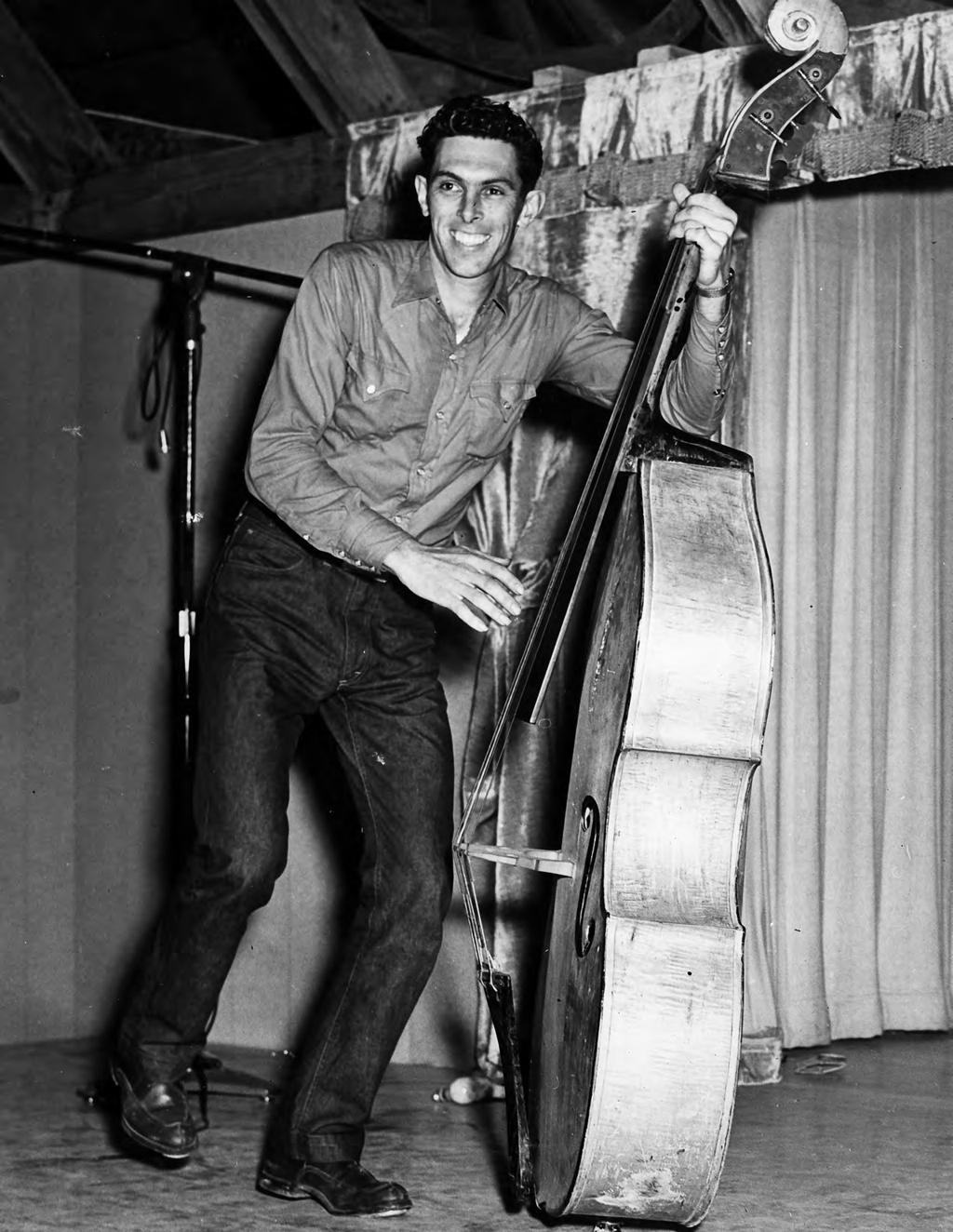 Lee Mace with his baseball bat bass, 1953. Although he had served in the Navy during World War II, during the Korean War Mace was drafted into the Army.