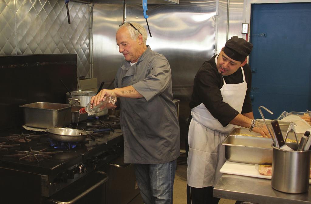 Bottom: Steve LaRosa, owner of LaRosa s Kitchen on Lincoln Avenue in Saugus, left, and Raul Rosario, the head chef with 30 years experience, work in the kitchen prior to the grand