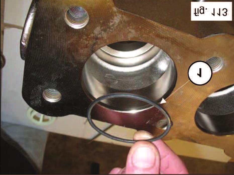 To facilitate insertion of the valve guide in its housing, you can use a pipe resting on