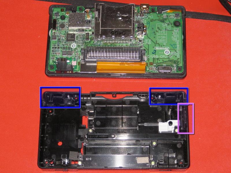 Removing Nintendo DS Lite Logic Board Screws Step 8 Carefully separate the two pieces by hand.
