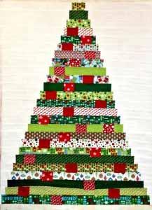 Step seven: Sew the tree rows together. This will secure the top and bottom of each pocket into the rows. The pockets are horizontal with openings on each side.