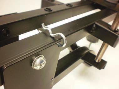 Use the hair pin to secure the pivot arm for transportation & storage.