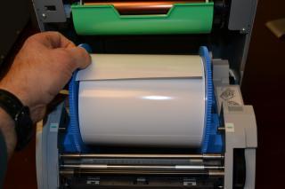 9. Set the roll of paper